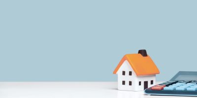 Mortgage,Calculator,Or,Real,Estate,Business,Concept.,Office,Desk,With