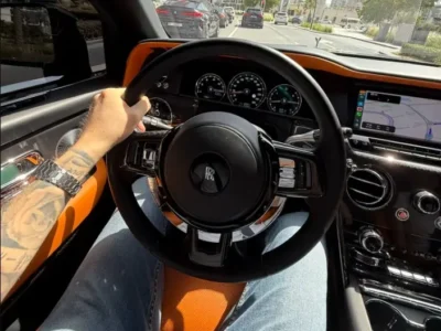 Oleksandr Orlovskyi driving a car